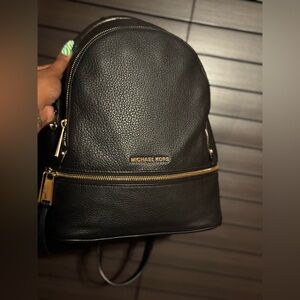 Michael Kors Black Leather Backpack with gold zipper detail